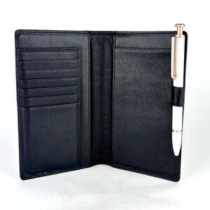 TUMI Black Leather Travel Wallet with Pen Loop – Sleek & Functional